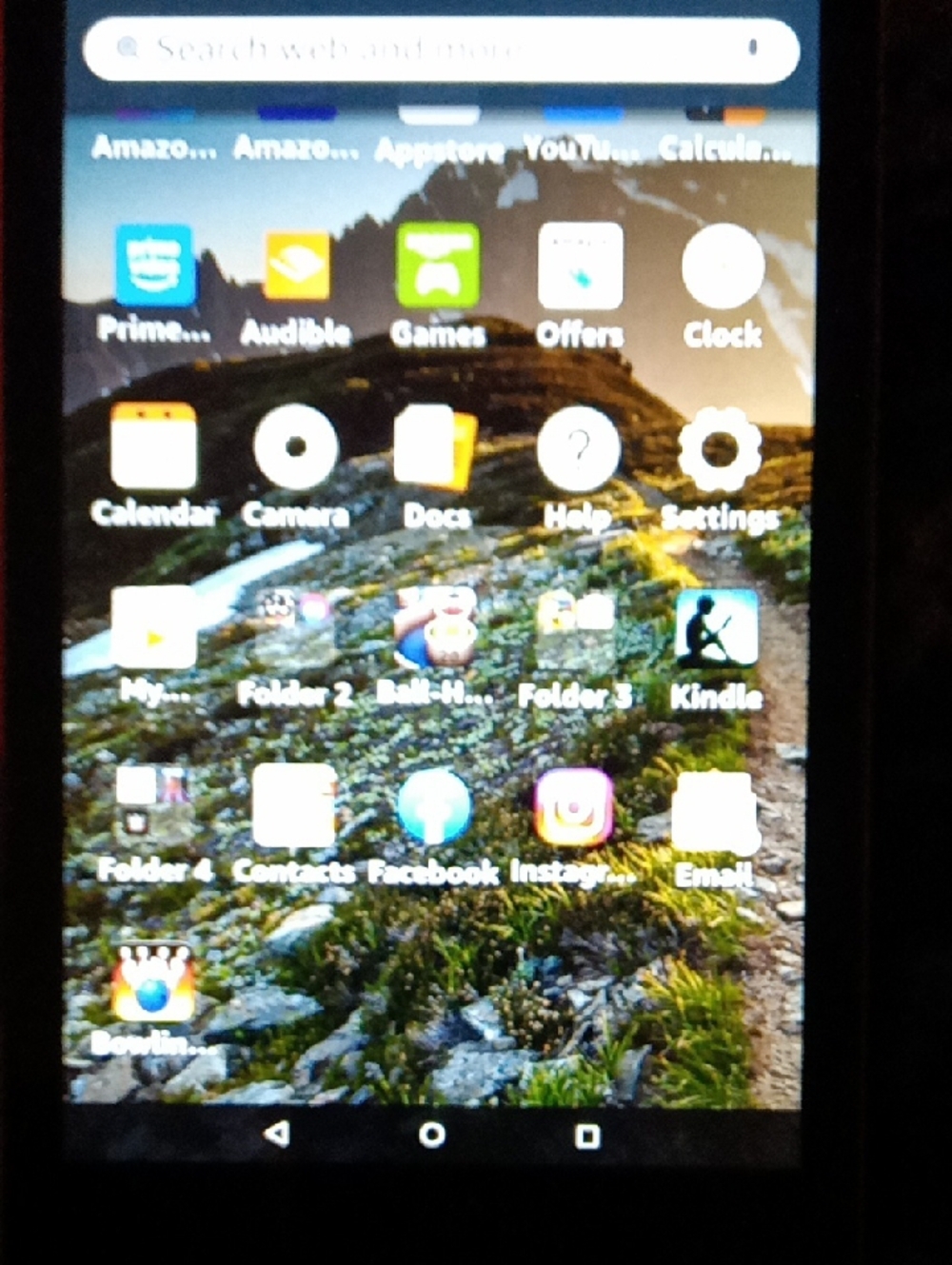 Amazon Tablet with Black Bezel and Colorful App Icons